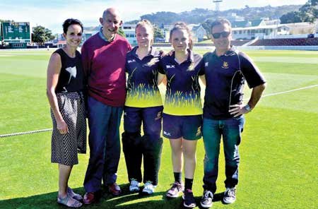 Amelia Kerr with her parents and grandfather