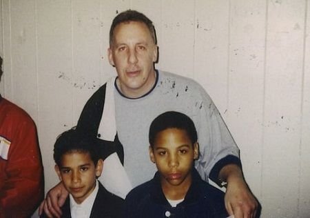 Andre (right) with his father and brother