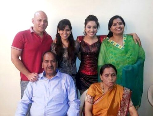 Asha Negi with her family