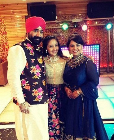 Ashnoor Kaur with her parents