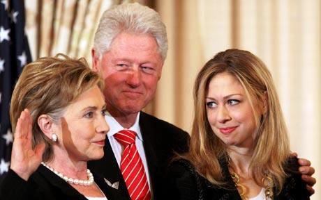 Chelsea Clinton with her parents