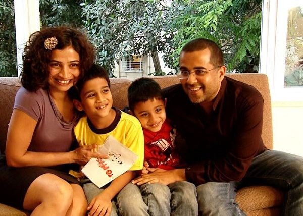 Chetan Bhagat with his wife Anusha and sons Ishaan (left), Shyam (right)