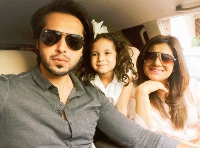 Fahad Mustafa with his wife and daughter