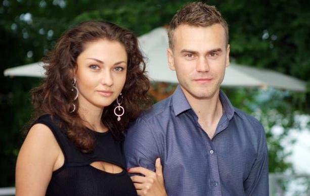 Igor Akinfeev with his wife Ekaterina Garun