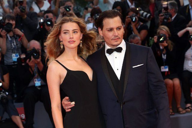 Johnny Depp with his girlfriend Amber Heard