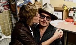 Johnny Depp with his girlfriend Kiley Evans