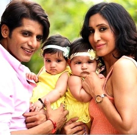 Teejay Sidhu with her husband and twin daughters