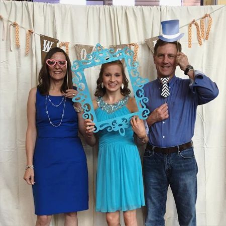 Madison with her parents on their anniversary