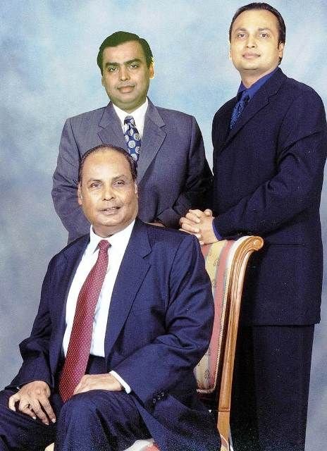 Mukesh Ambani with his father Dhirubhai Ambani (sitting) and brother Anil Ambani (right)