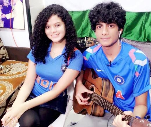Palak Muchhal with her brother