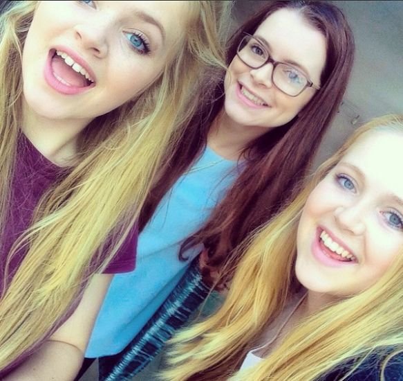 Pippa Hughes with her sisters