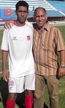 Roberto Firmino with his father