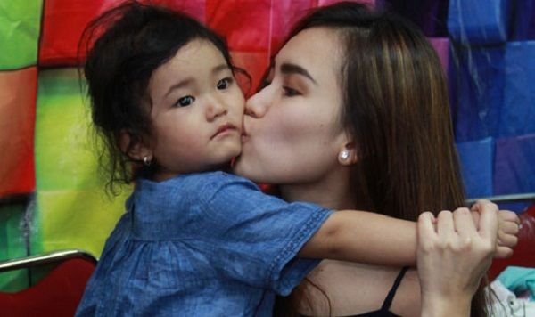 single mother Ayu Ting Ting with her daughter