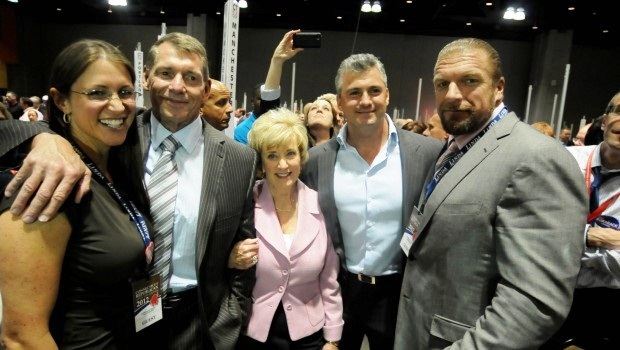 Stephanie McMahon with her parents, brother and husband