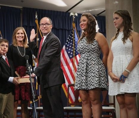 Thomas Perez with his wife and children