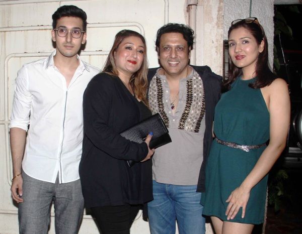 Govinda with his wife and children